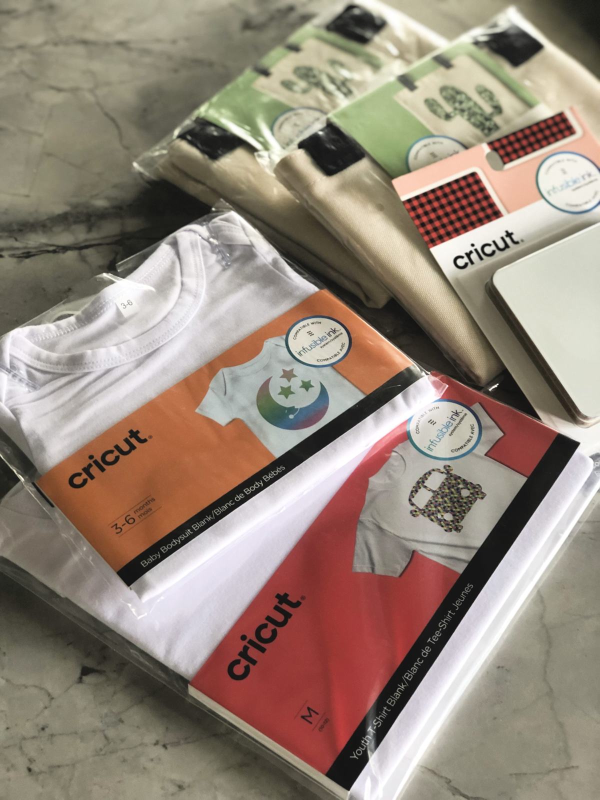 Cricut® Infusible Ink™ blanks with bags and coasters.