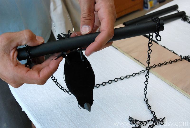 Black PVC pipe with wire going through it.