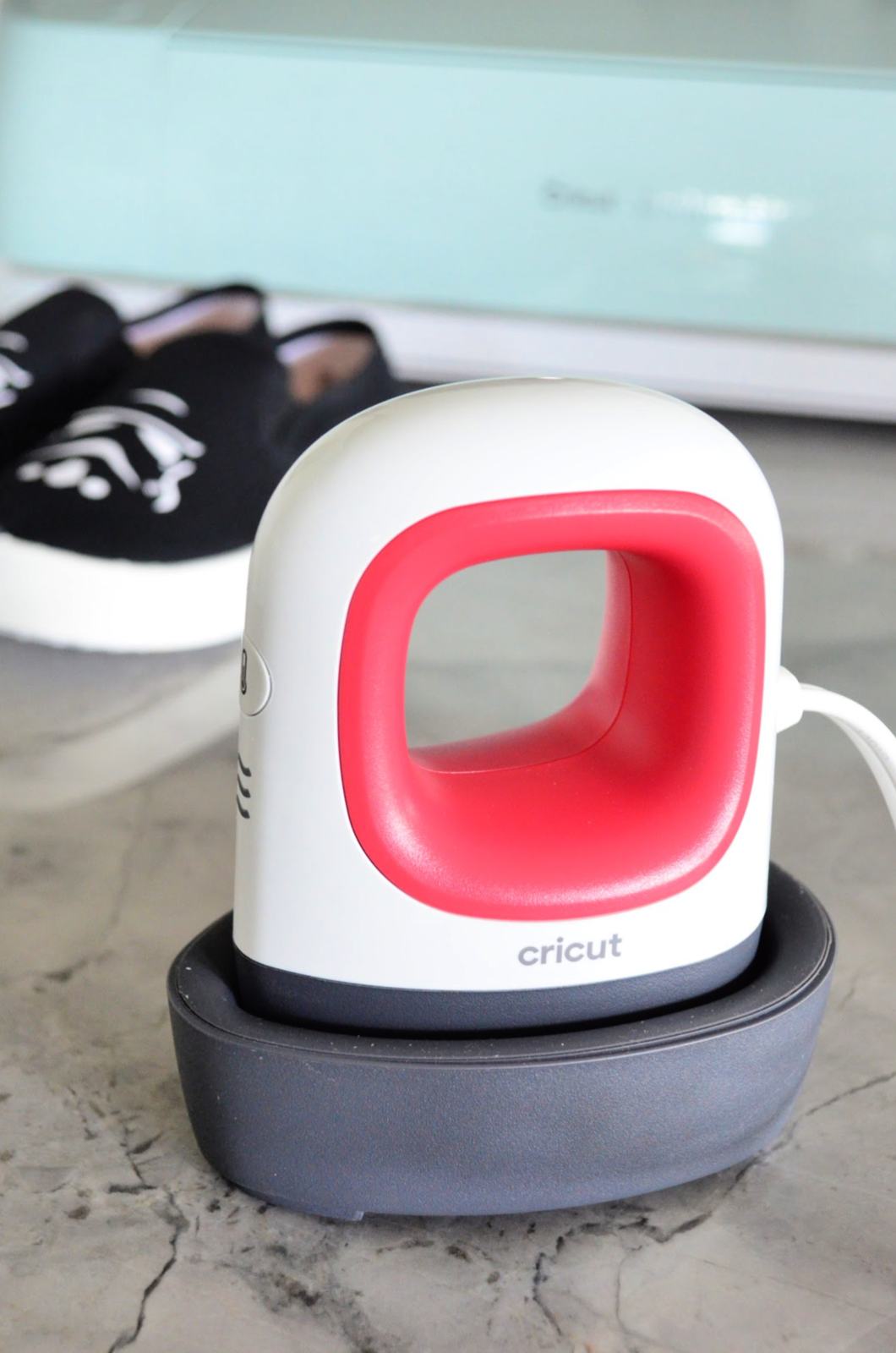 Cricut EasyPress Mini with Stormtrooper Shoes int he background