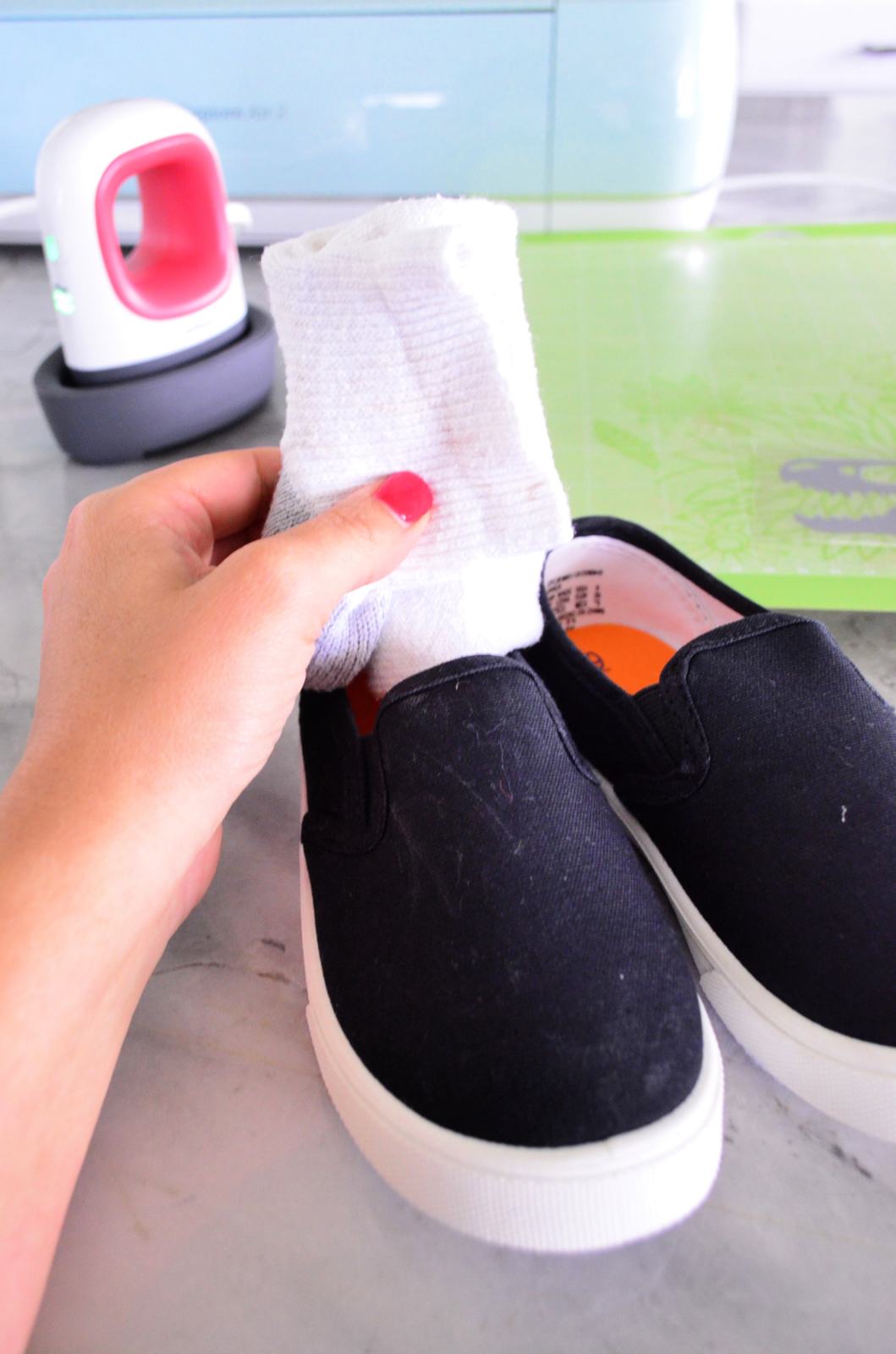 Stuffing Socks into a Canvas Shoe