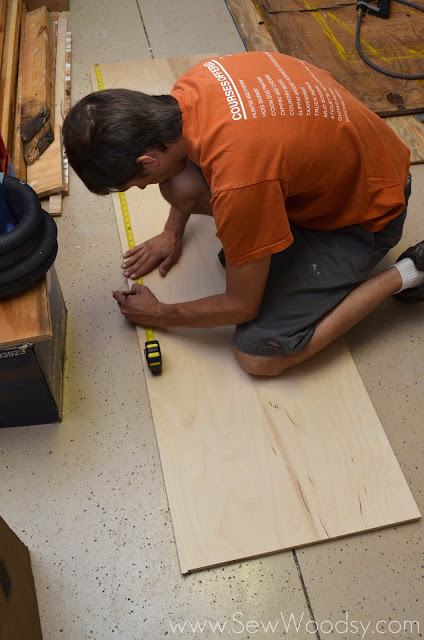 measuring PureBond Hardwood Plywood for kitchen shelve