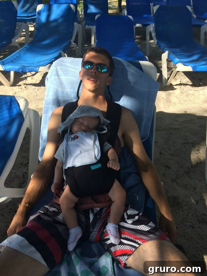 Tiny Traveler's Maiden Voyage 14 Baby Wearing on Coco Cay Beach