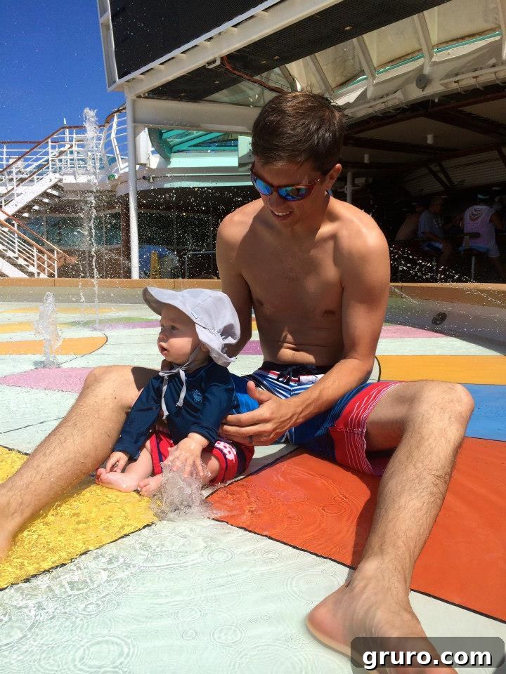 Tiny Traveler's Maiden Voyage 19 Baby in Splash Pad on Cruise Ship