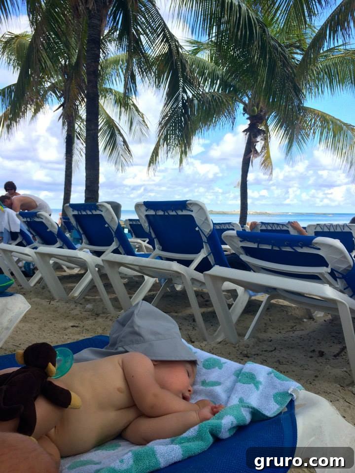 Tiny Traveler's Maiden Voyage 5 Infant Sleeping in Coco Cay: A Peaceful Moment