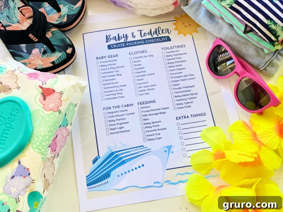 Packing list for toddlers on a cruise, featuring pink sunglasses, a yellow lei, and Pampers wipes, laid out on a table.