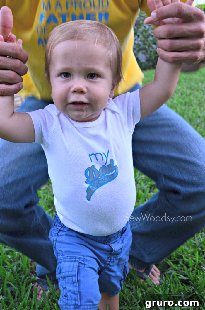 Ryder showing off his 'My Dad Rocks' Onesie outdoors