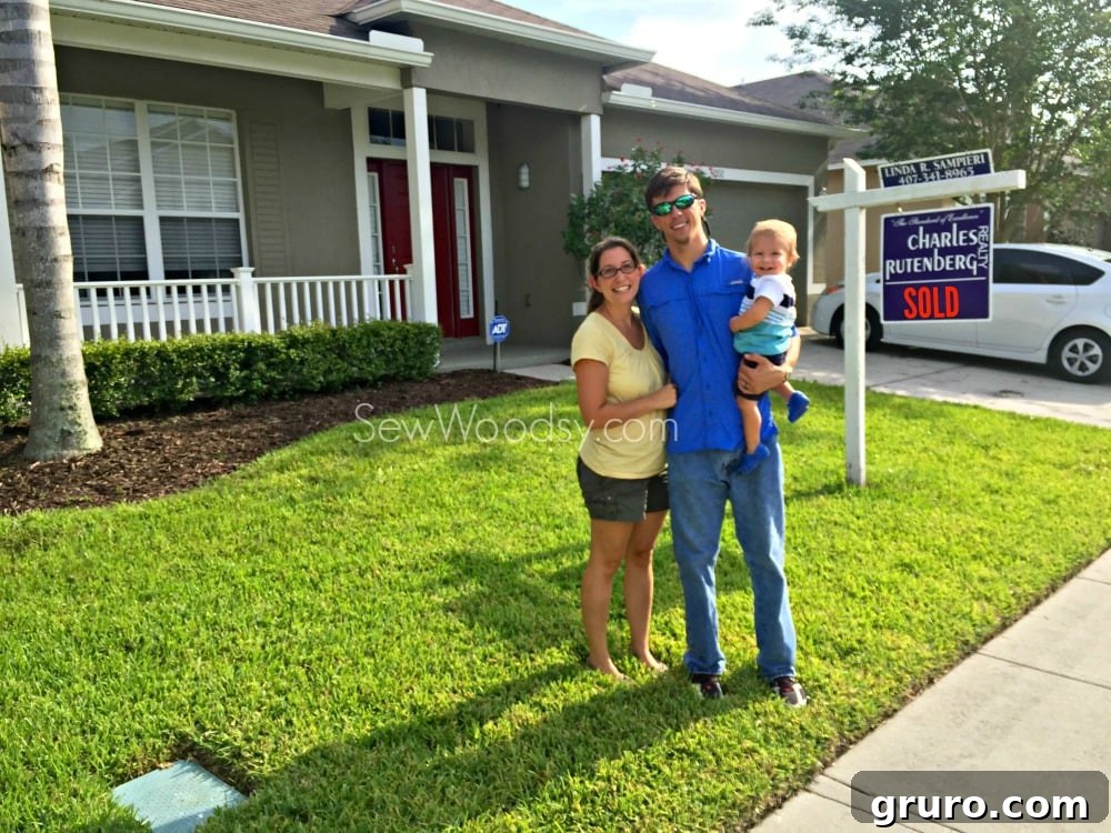 Family in front of first home