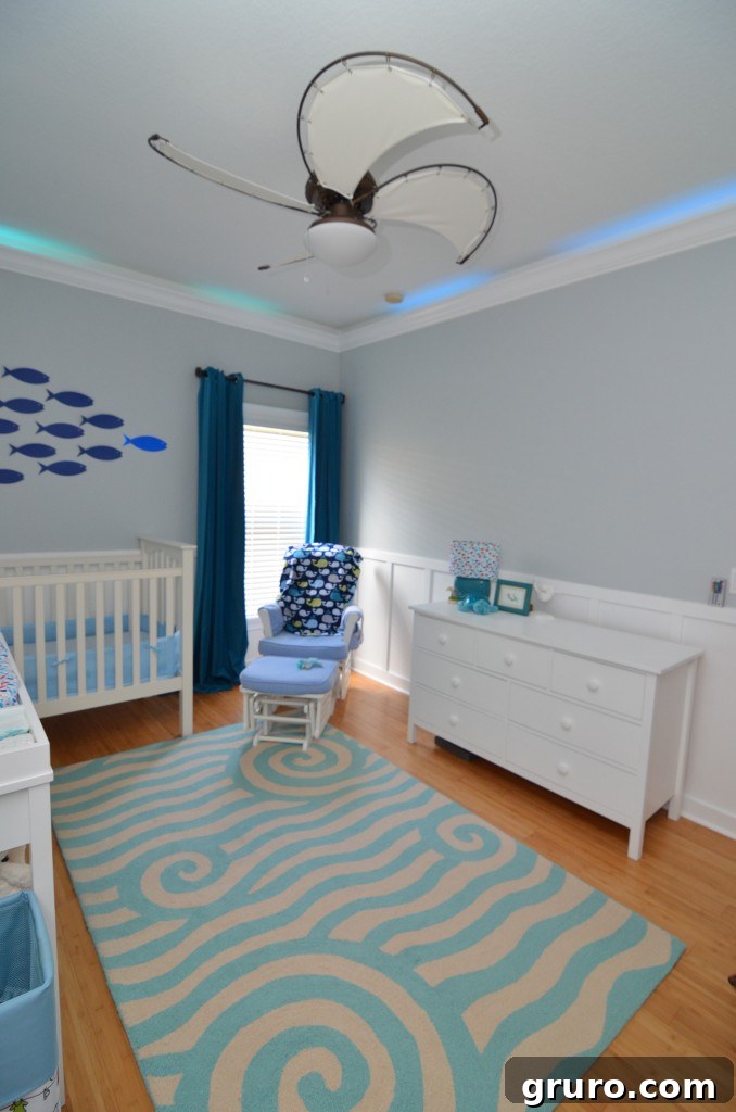 Stunning Whale Nursery with Elegant Nautical Ceiling Fan