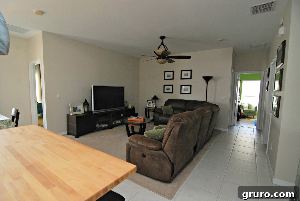 Expansive view of the living room captured from the kitchen area