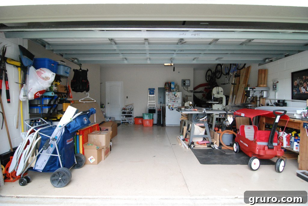 Cluttered yet organized garage space with various tools and equipment