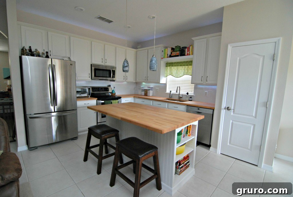 Modern kitchen with stainless steel appliances and ample counter space
