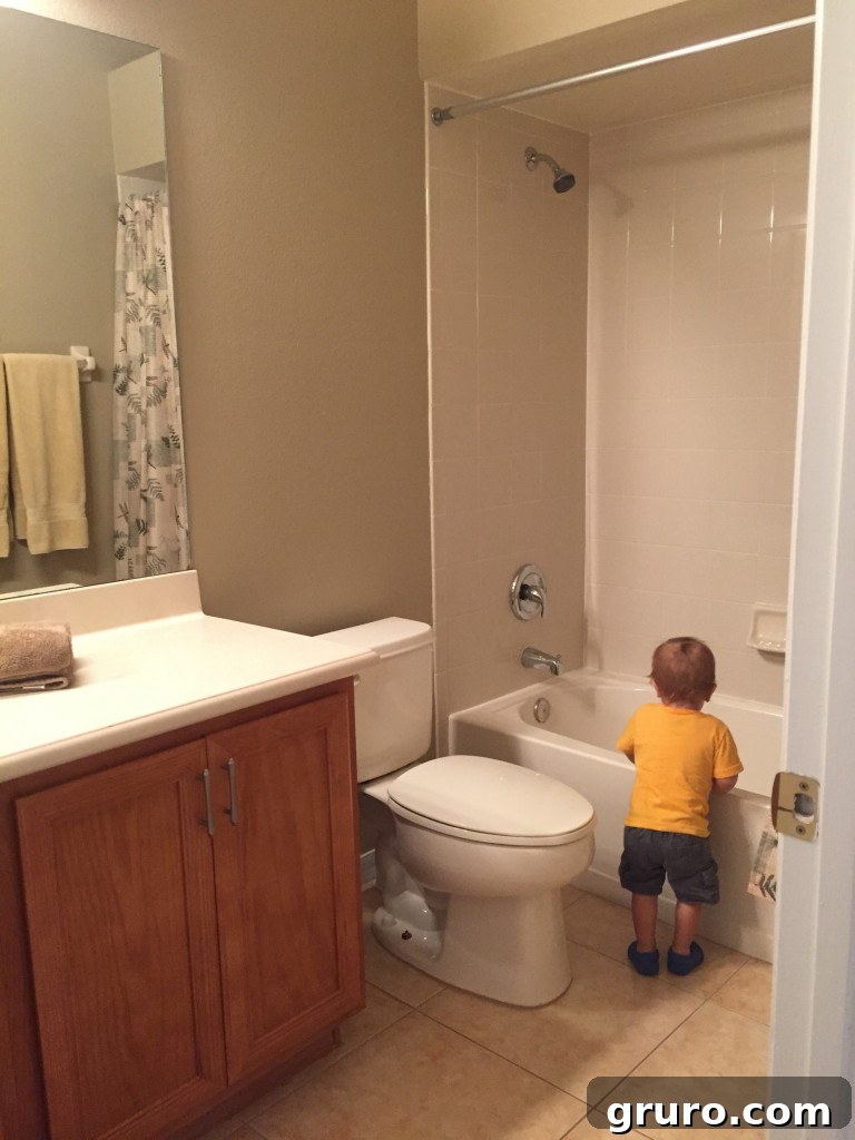 Ryder checking out his new guest bathroom