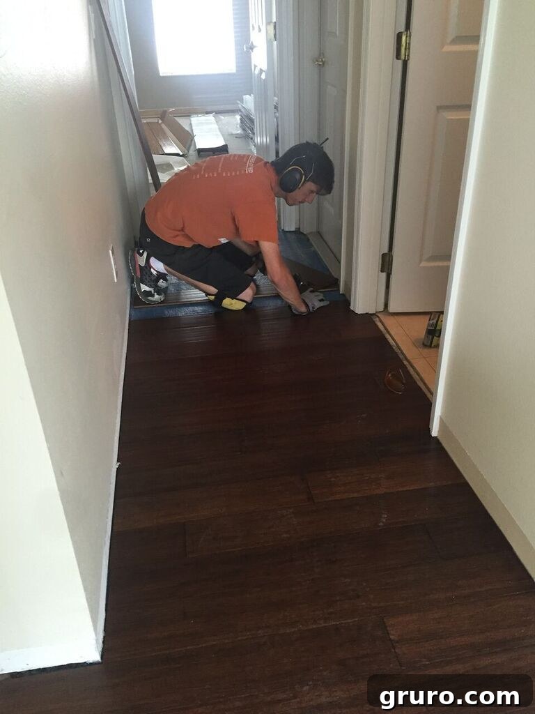 Transformation in Progress 12 Installing new hardwood floors in a home hallway