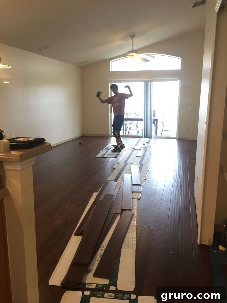 Transformation in Progress 15 Main living area with finished hardwood floors, ready for furniture