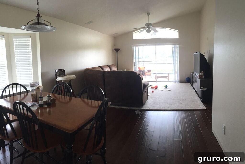 Connecting dining room and living room, in a new house with temporary setup and unpacking in progress