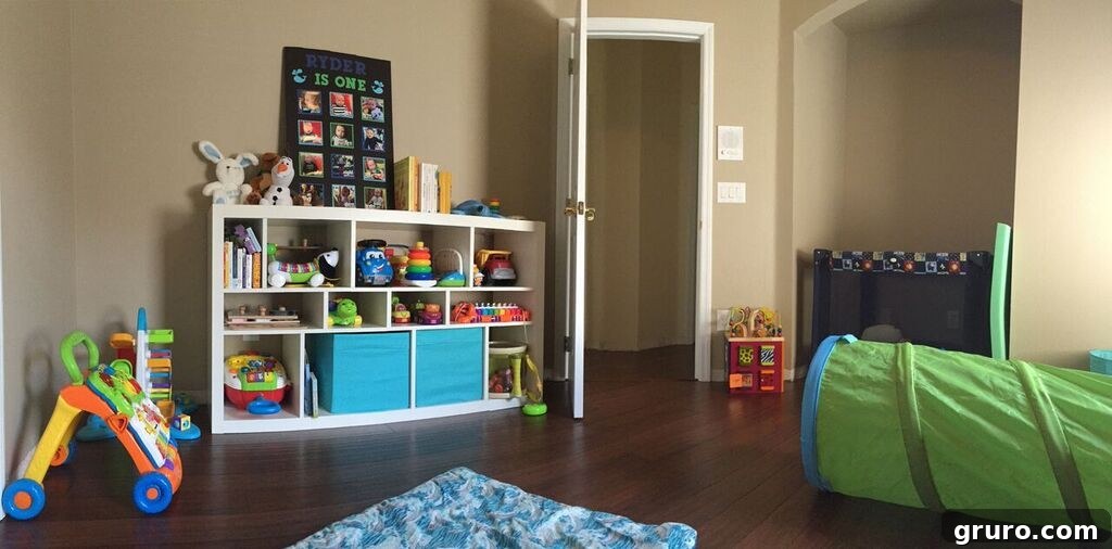 Playroom bookshelf filled with colorful children's books and toys, organized and inviting