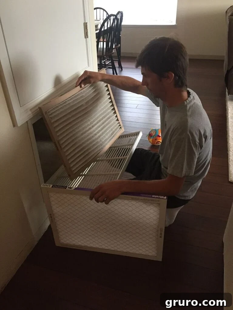 Extremely dirty and clogged air filter, highlighting the need for regular replacement, especially after renovation