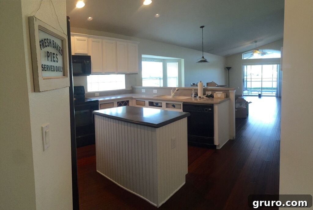 Close-up of newly installed white kitchen cabinets, showcasing sleek design and craftsmanship