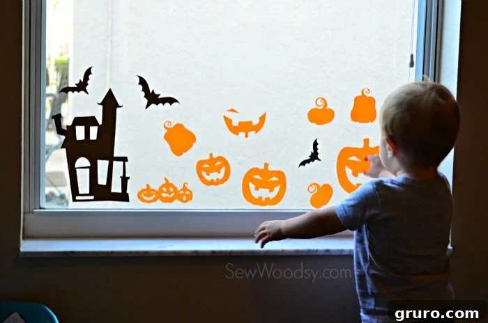 DIY Halloween Window Clings 7 - Toddler Interaction