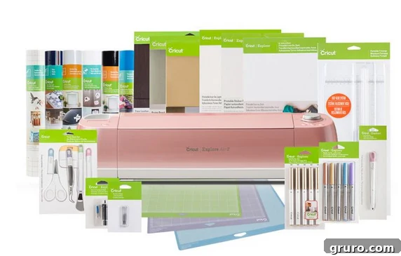 A vibrant pink Cricut Explore Air 2 machine, accompanied by various mats, pens, and other crafting materials, illustrating its readiness for diverse projects.