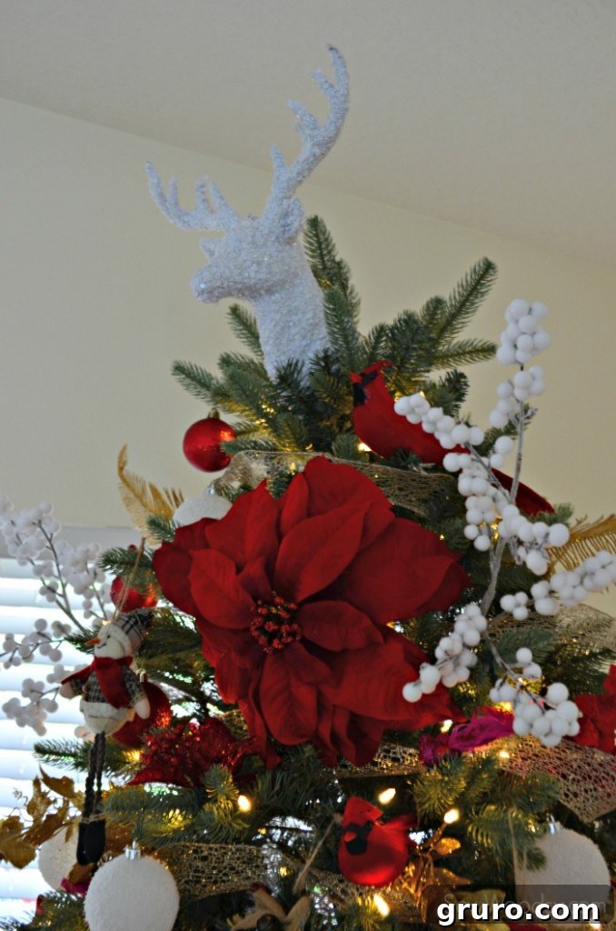 The Toddler-Proof Christmas Tree 10 Sparkling Glitter Deer Christmas Tree Topper from At Home