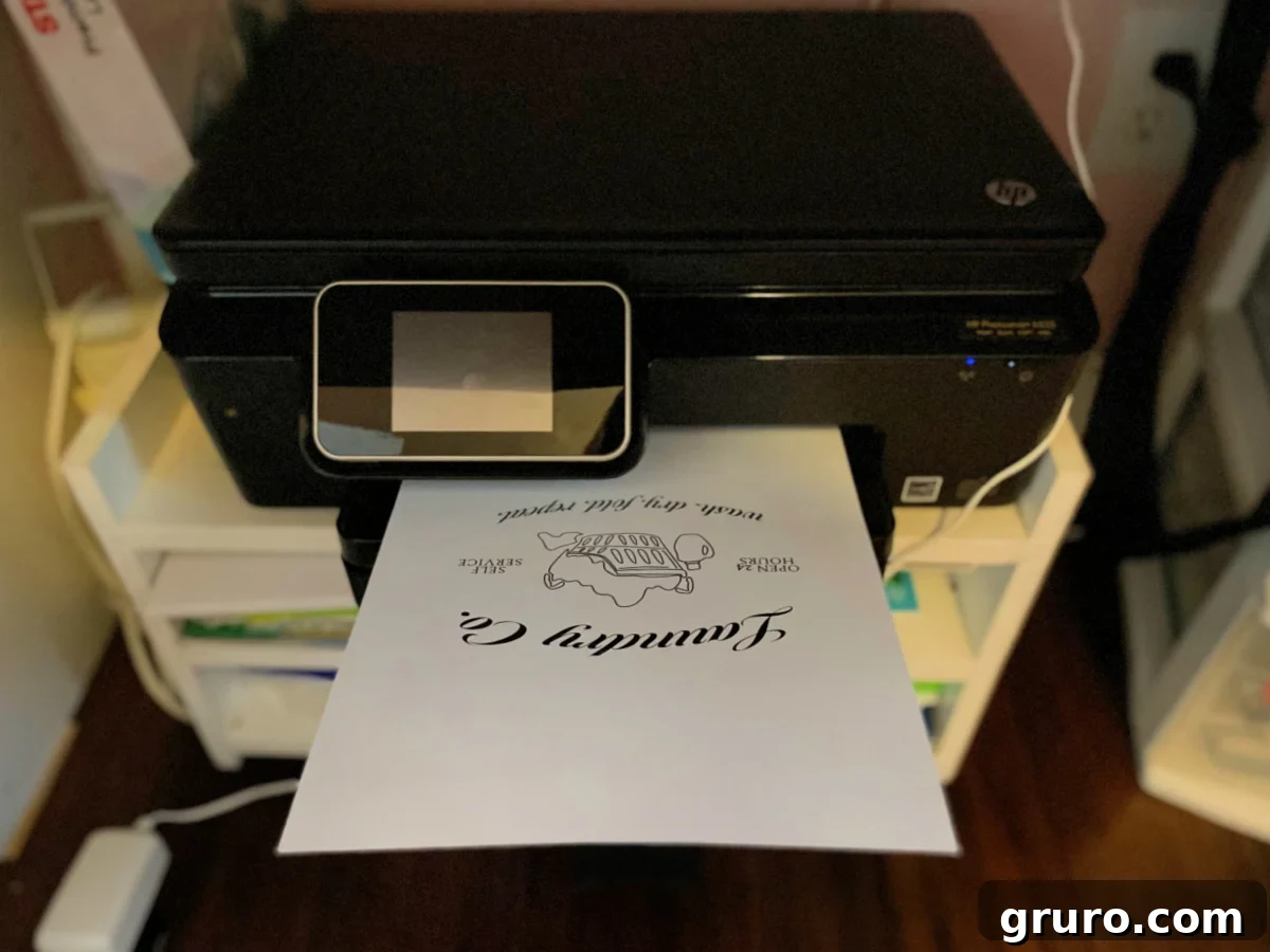 A black printer actively printing a document that clearly displays "Laundry Co.", symbolizing the easy first step to creating your new laundry room decor.