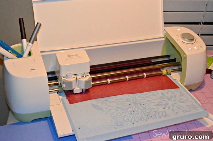 Cricut Explore Cutting Red Glitter and Black Iron-On Vinyl
