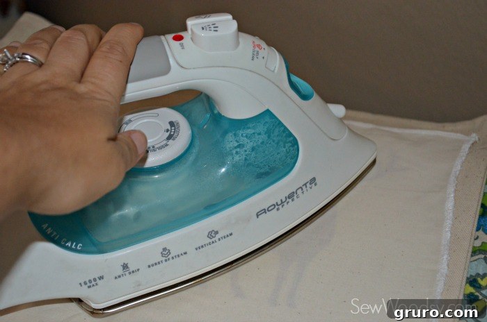 Final Heat-Setting with Muslin Cloth for Durable Iron-On Vinyl Adhesion
