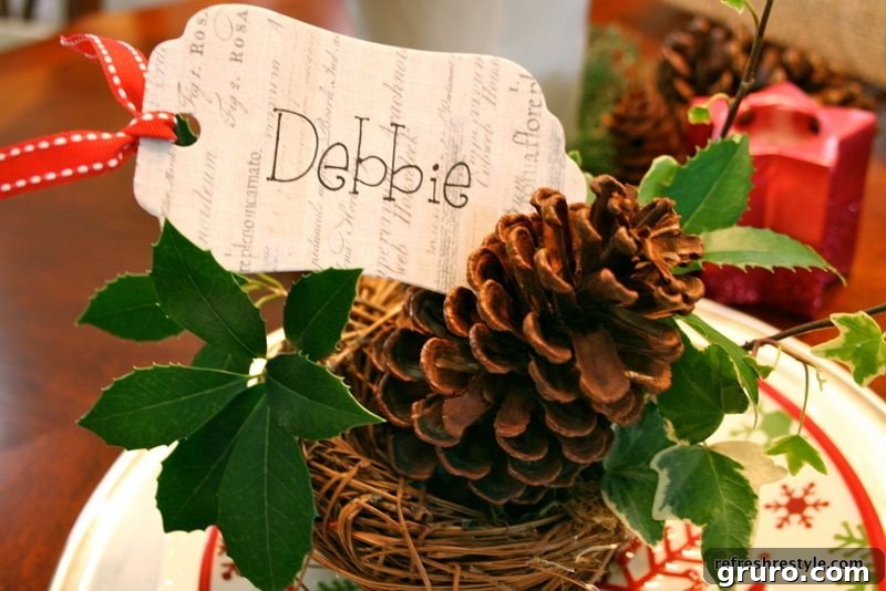 The same rustic setting updated with a pinecone and ivy for a festive Christmas feel.