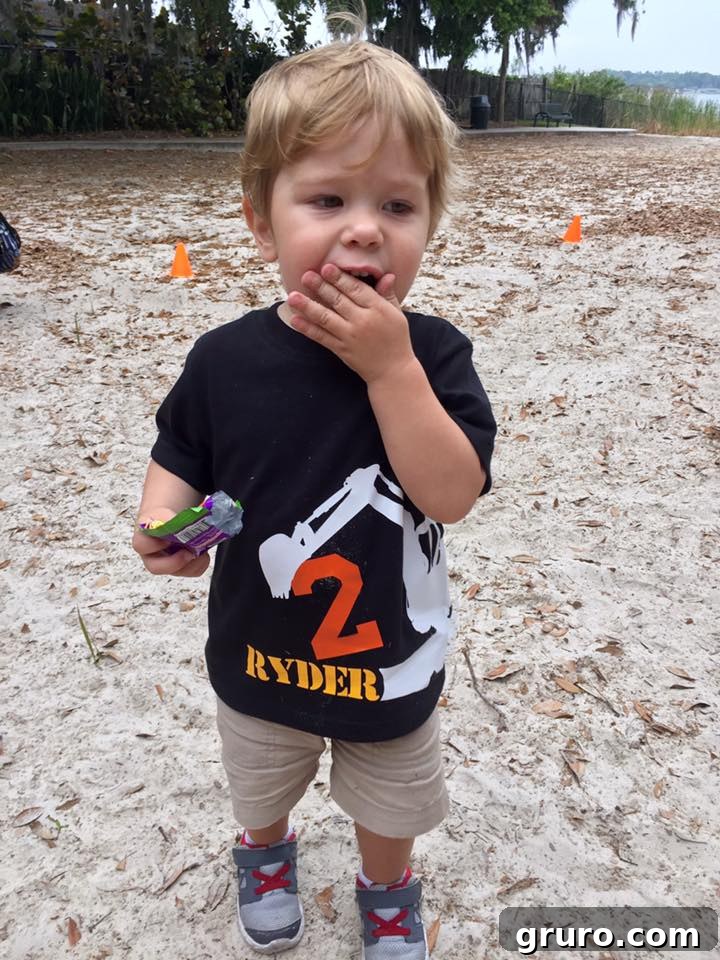 Birthday boy Ryder wearing his 2nd Birthday Construction T-Shirt at his party