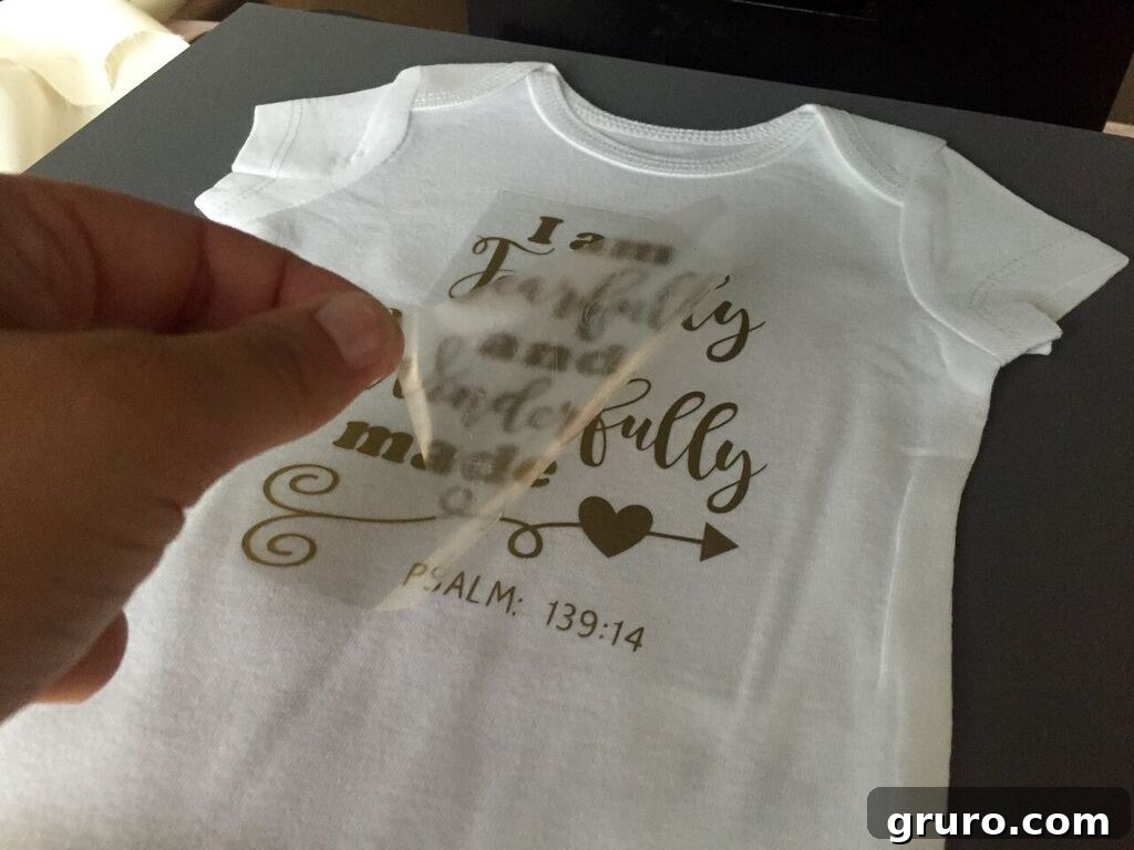 Fearfully and Wonderfully Made Onesie - Peeling off plastic
