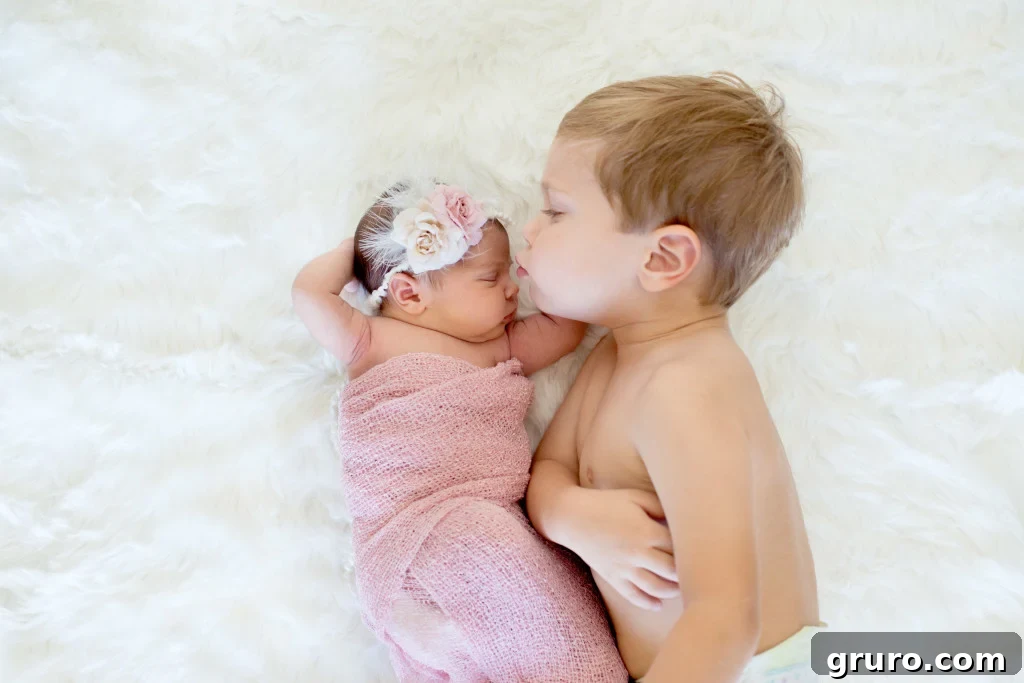 Heartwarming Sibling Photo with Newborn