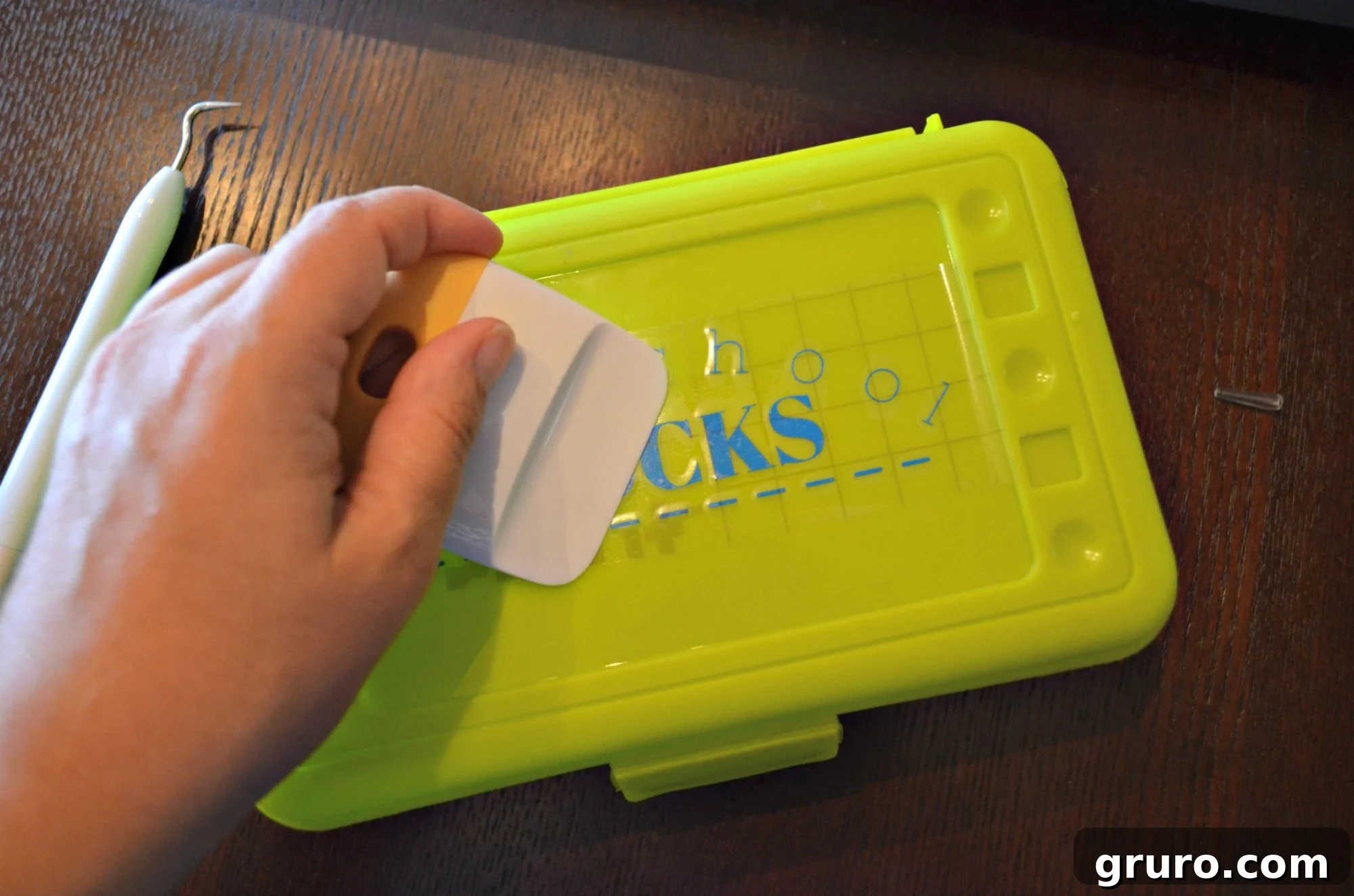 Awesome School Day Clip Art 10 Applying vinyl with squeegee to pencil box