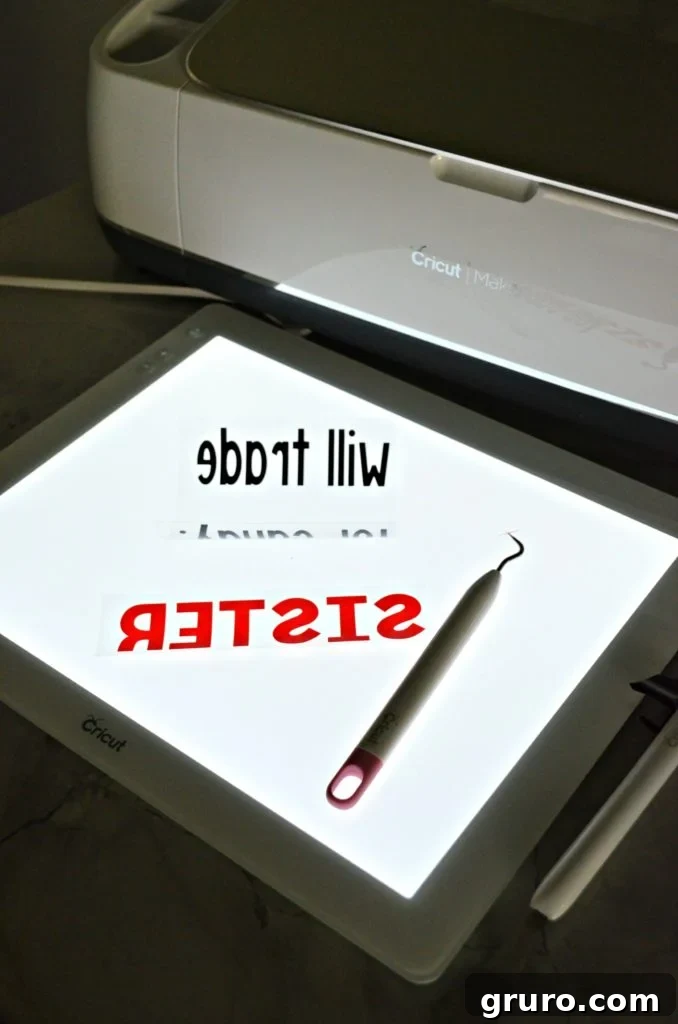 Craft Your Own Sibling-for-Sweets Tee 3 Will Trade Sibling for Candy - Cricut BrightPad in action