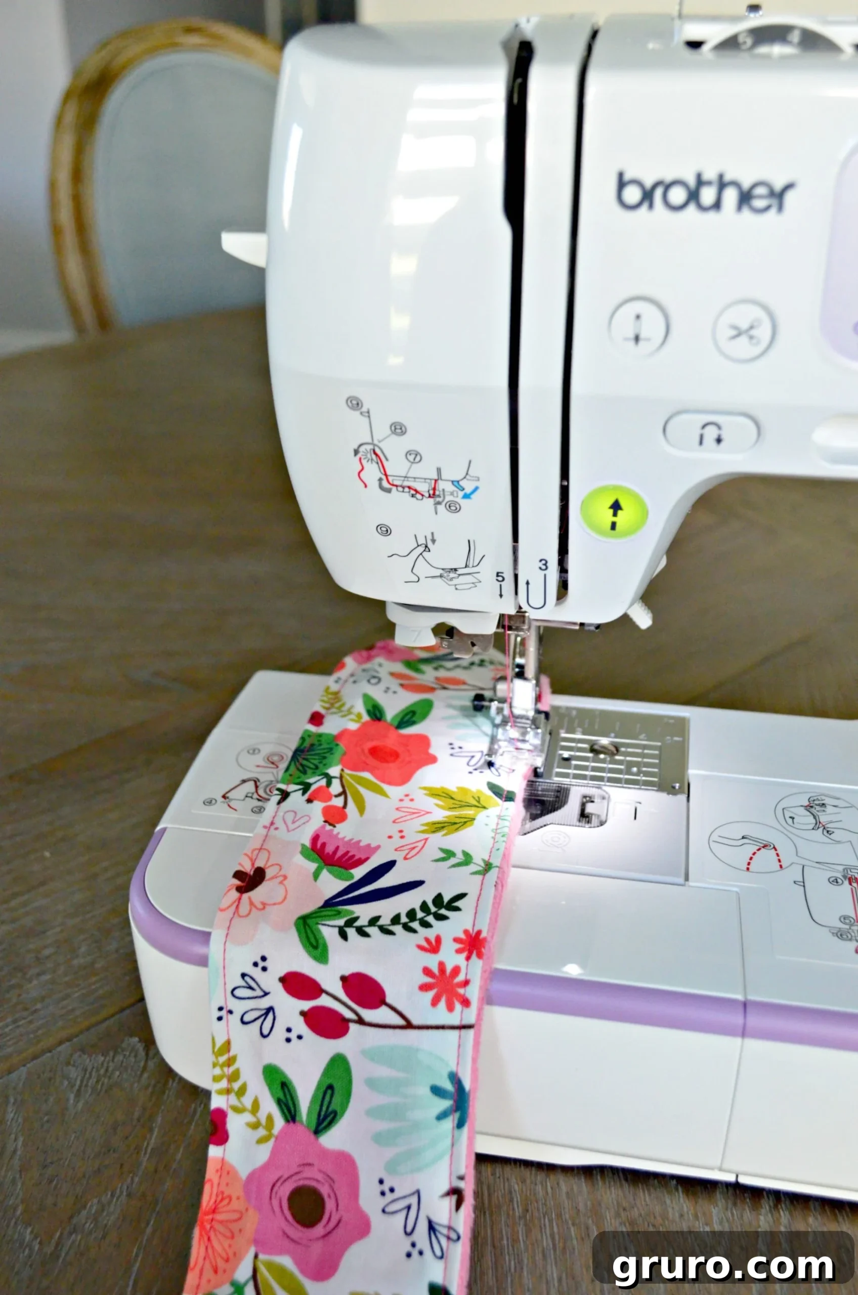 Brother sewing machine sewing around the perimeter of the fabric.