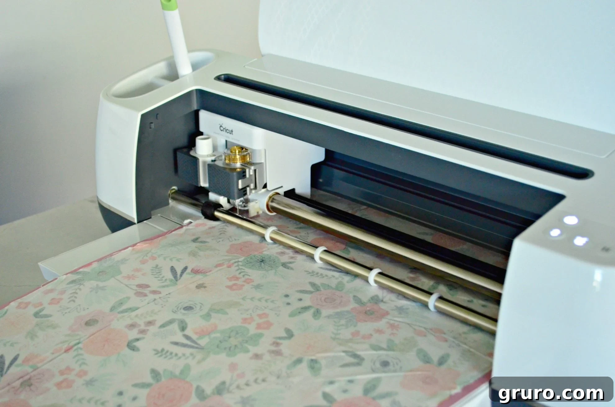 White Cricut Maker Cutting Fabric