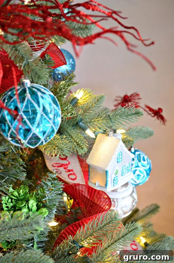Whimsical Christmas Tree Featuring a Charming Cozy House Ornament