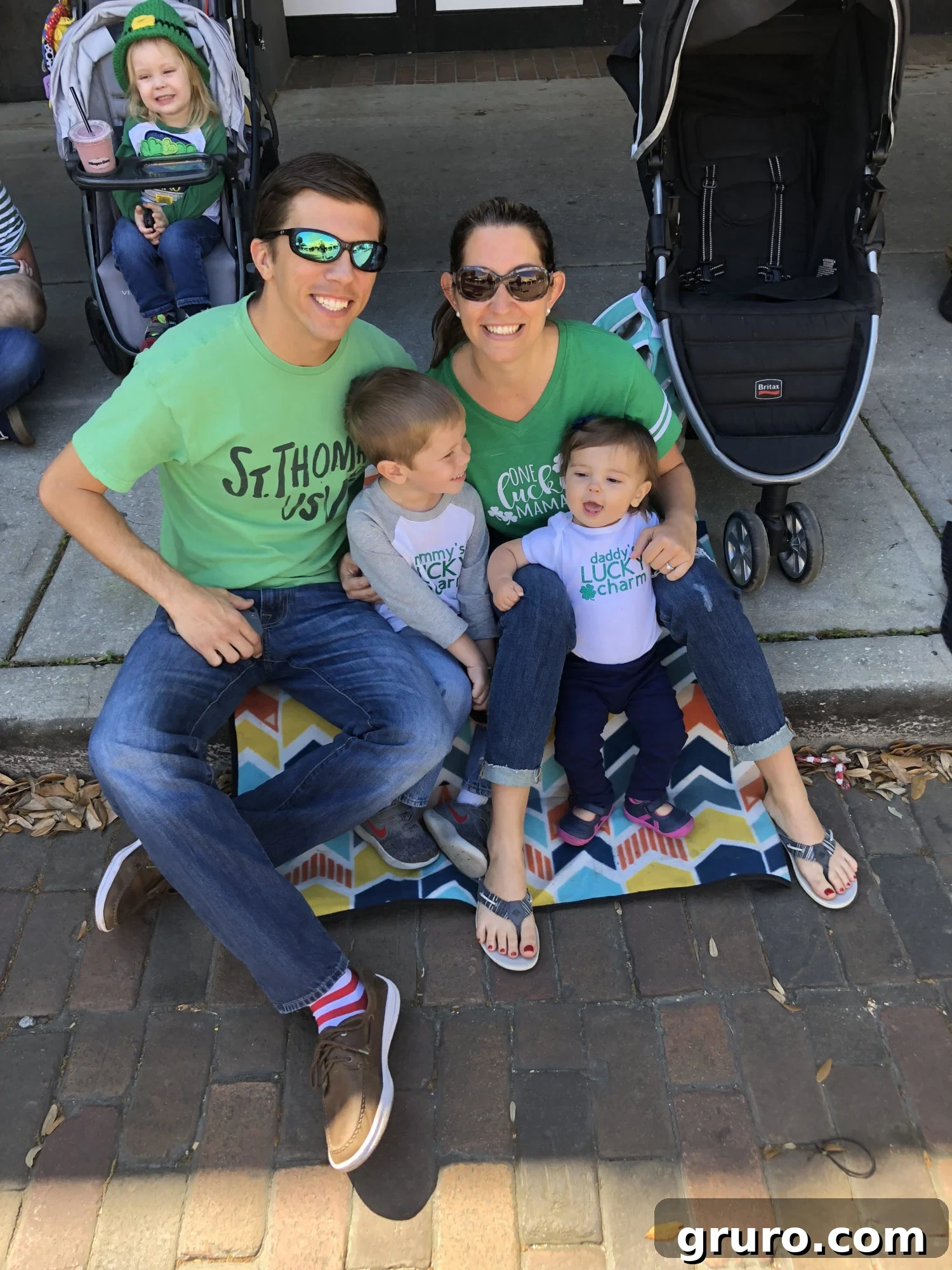 Talisman Tee 12 Family wearing St. Patrick's Day parade shirts, including 'Lucky Charm' designs
