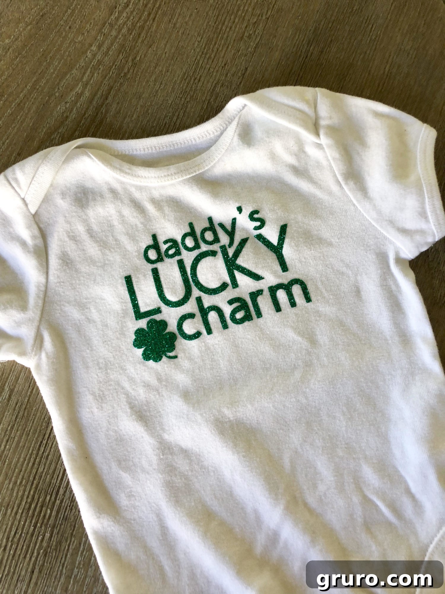 Talisman Tee 7 Finished 'Daddy's Lucky Charm' T-Shirt showing applied glitter vinyl