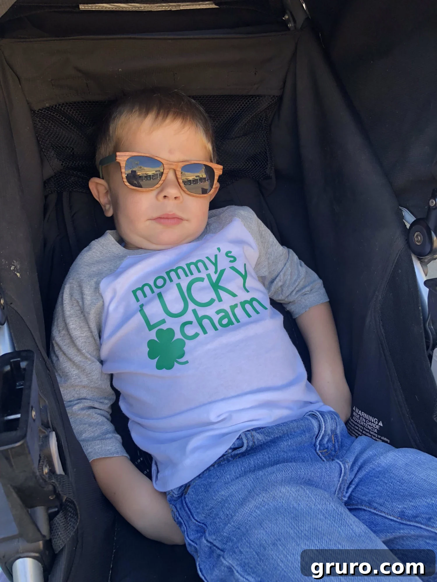Talisman Tee 10 Mommy's Lucky Charm T-Shirt being worn by a child taking a nap