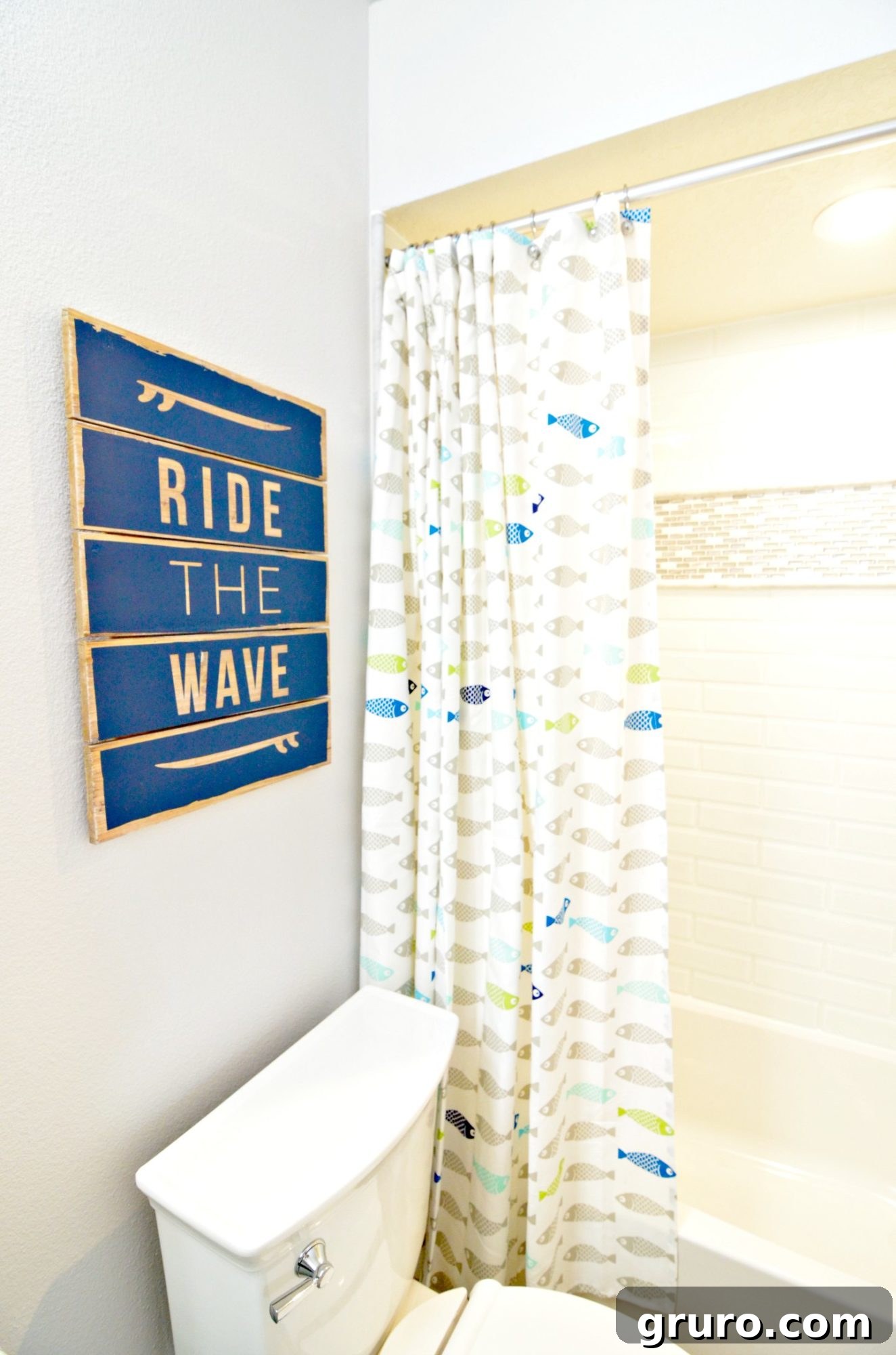 Decorative Ocean-Themed Wall Sign in Kids Bathroom