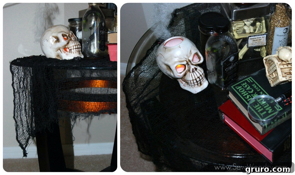 Decorating with Creepy Cloth: Spooky End Table Display Spooky end table decorated with creepy cloth and Halloween props
