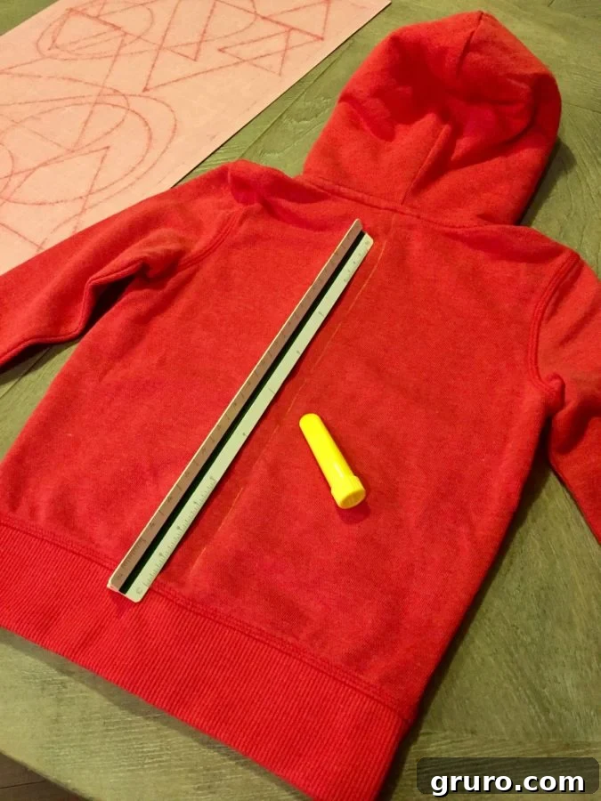 Measuring sweatshirt for spike placement