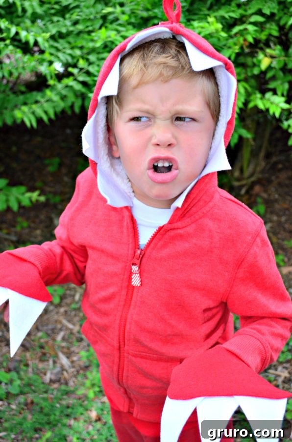 Child in a No Sew Dinosaur Costume, posing