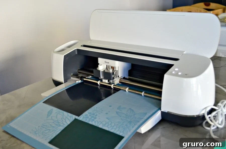 Cricut Maker precisely cutting Iron On Vinyl for the 'So Franken Cute' Halloween T-Shirt project