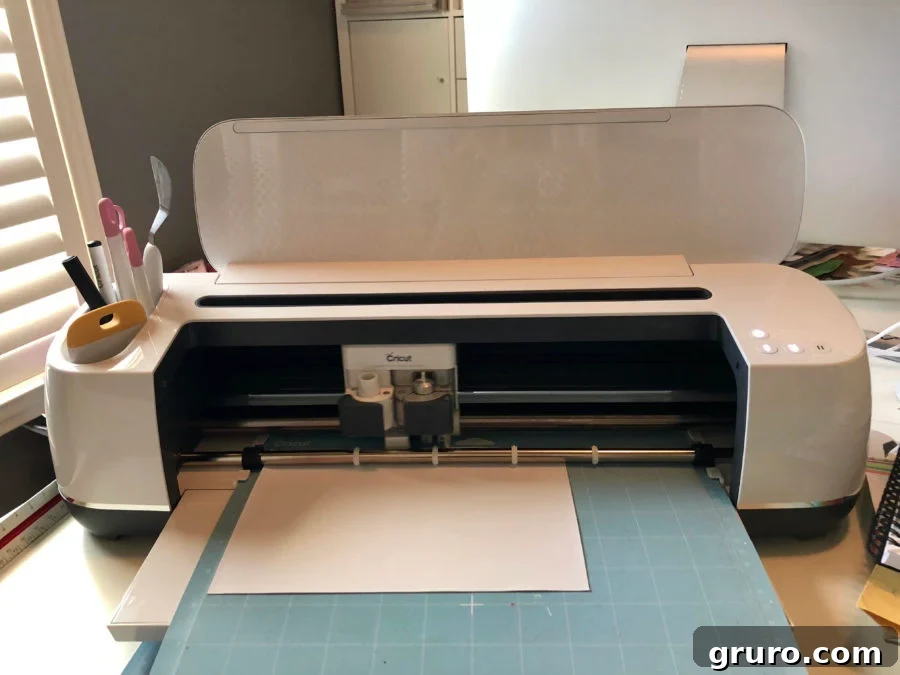 Cricut Maker cutting Iron-On Vinyl for DIY Halloween dress