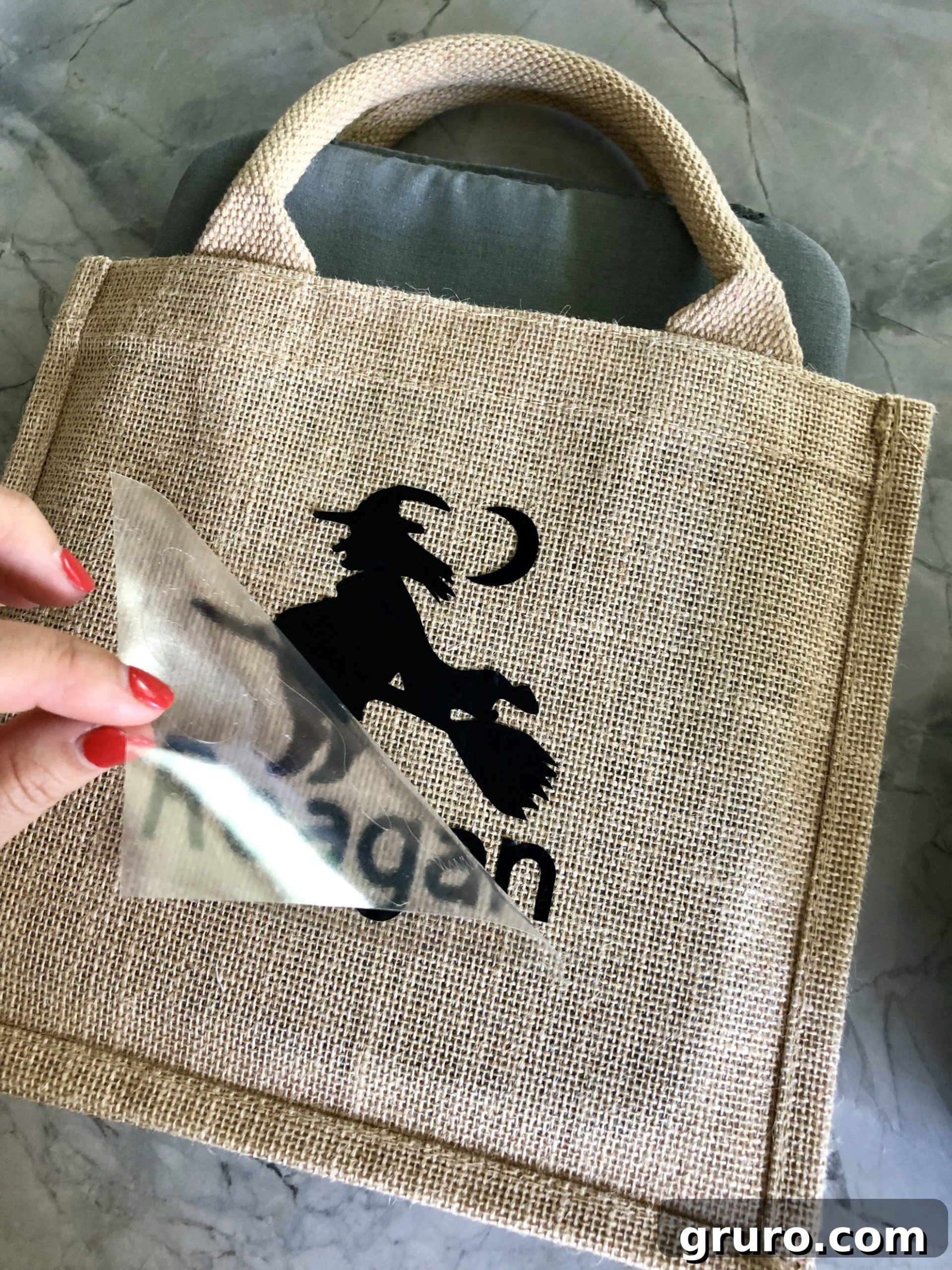 Personalized Burlap Trick or Treat Bag peeling film off Iron-On Vinyl