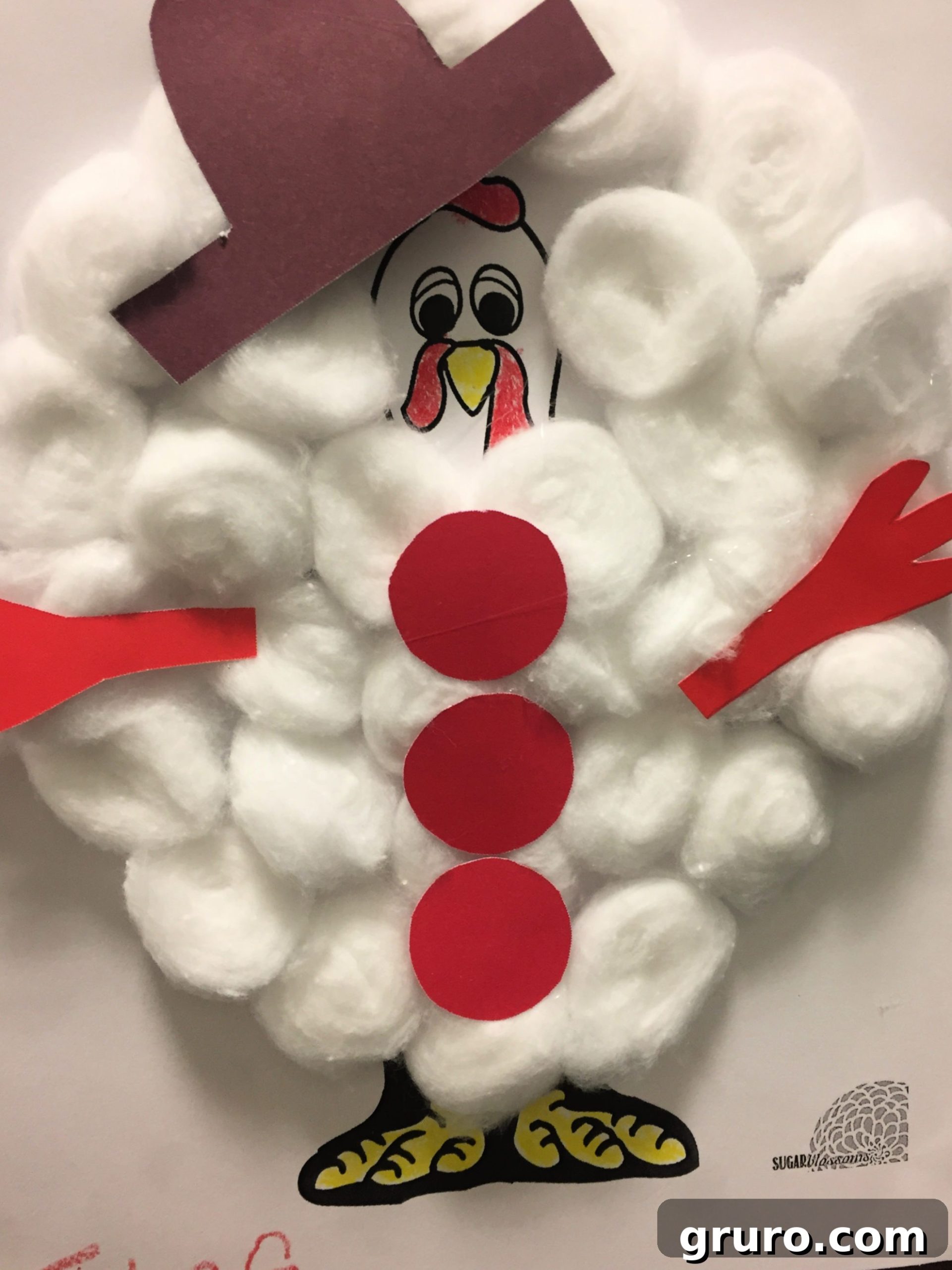 Turkey In Disguise as a Snowman filled with white cotton balls, red card stock for buttons and hands. 