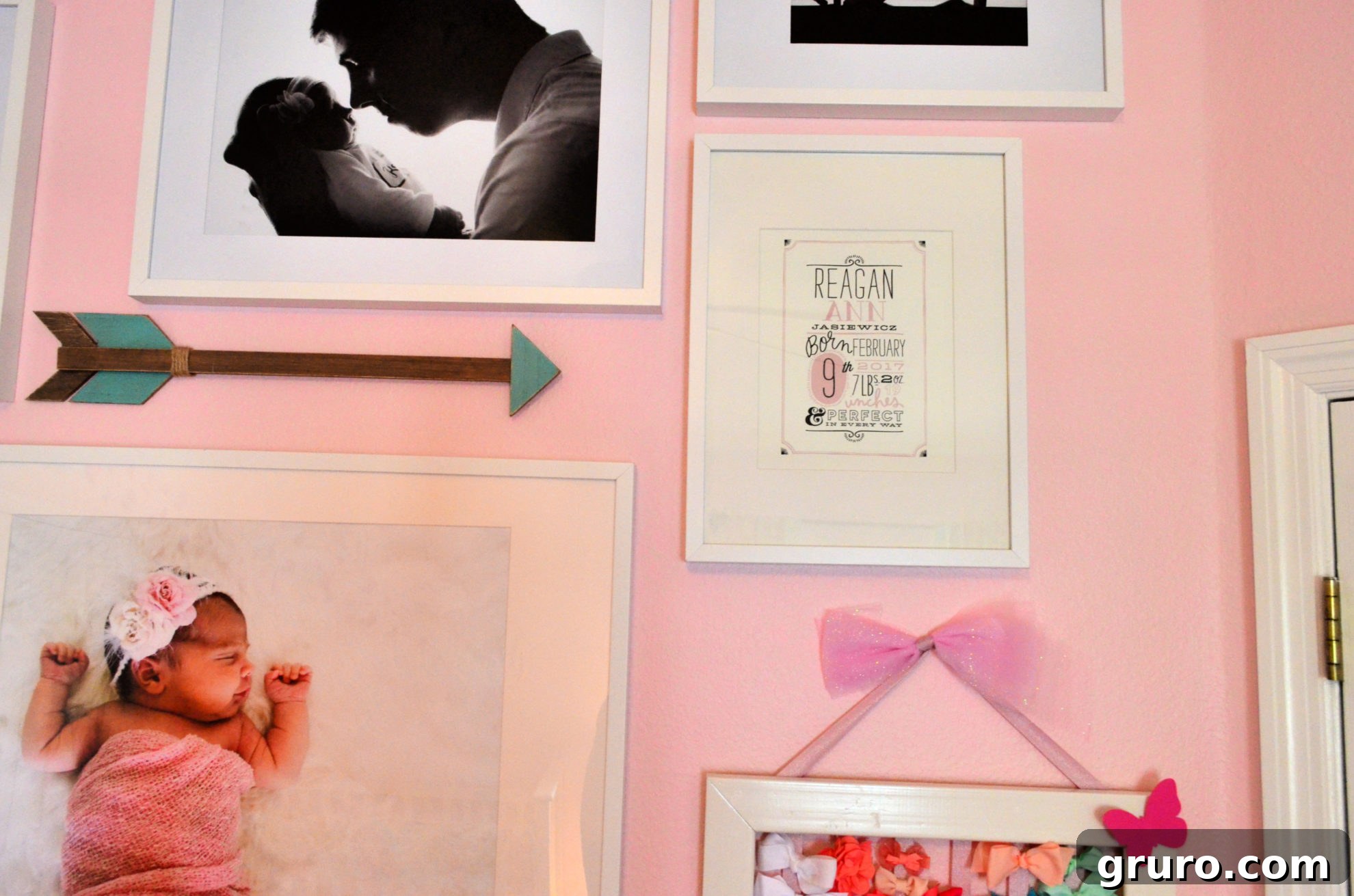 Close up of the Nursery Gallery Wall featuring a birth announcement print