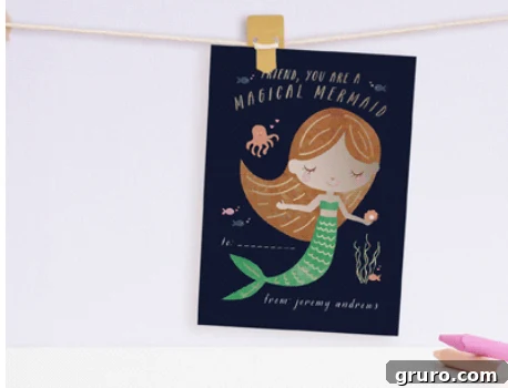 Mermaid with brown hair and green tail that says "magical mermaid" on the card.